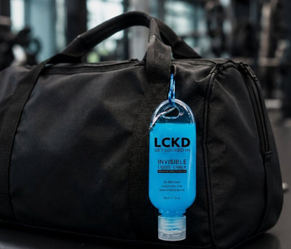 LCKD Clear Liquid Chalk bottle attached to gym bag